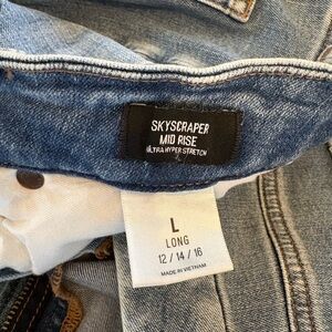 Express Skyscraper Mid Rise Boot Cut Jeans - Light Blue